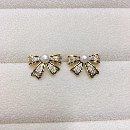 VINTAGE RIBBON BOW PEARL GOLD AND SILVER STUDS