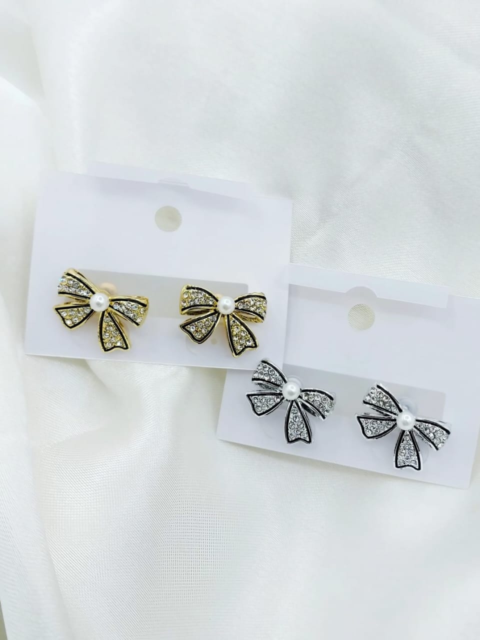 VINTAGE RIBBON BOW PEARL GOLD AND SILVER STUDS